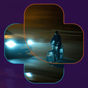 Fietser zonder licht steekt voorrangsweg over.